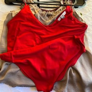red bodysuit